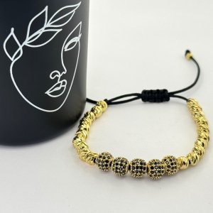 Bratara pe snur cu bilute aurii Bratara pe snur cu bilute aurii